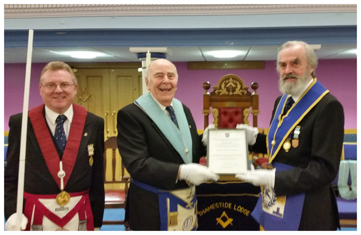 The Prov SGW  W.Bro. Brian Wright presented W.Bro.David Silverstone with a certificate to mark his 50 years as a Freemason.
